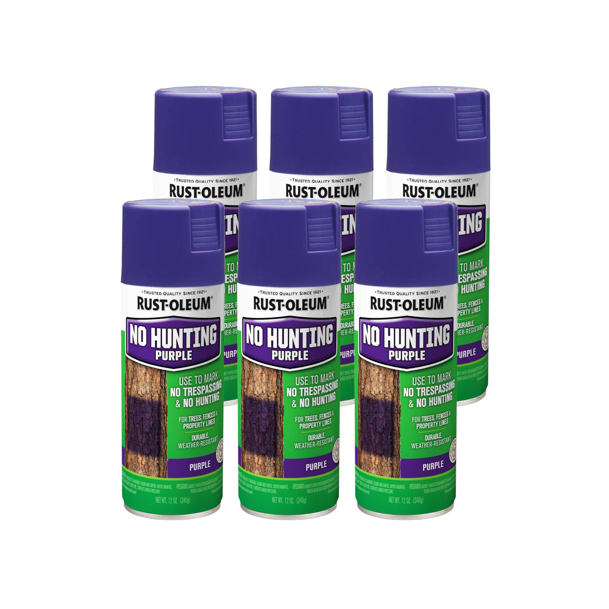 Rust-Oleum No Hunting Purple spray on a tree showing high visibility property marking