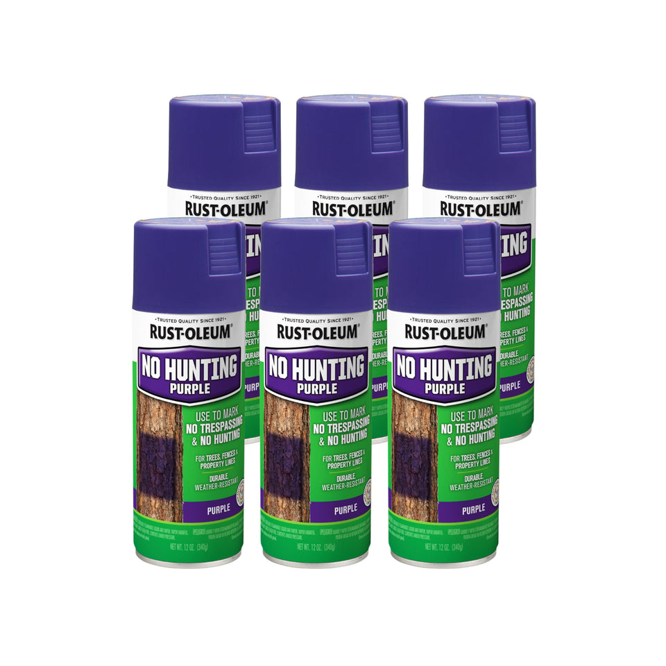 Rust-Oleum No Hunting Purple spray on a tree showing high visibility property marking