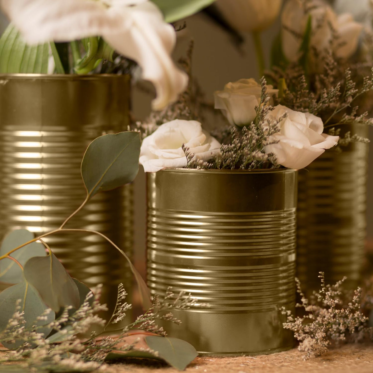 Rust-Oleum Specialty Metallic Spray Gold on ceramic pieces provides reflective elegance.