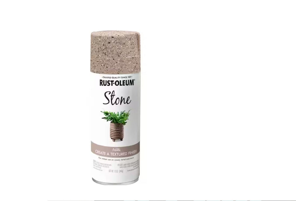 Rust-Oleum Stone Creations Pebble spray on a surface for durable indoor stone look