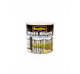 Rustins Quick Drying Matt Black Paint bottle close-up for quick interior projects