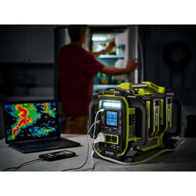 RYOBI 40V 6.0Ah battery used with a leaf blower for efficient cleanup.