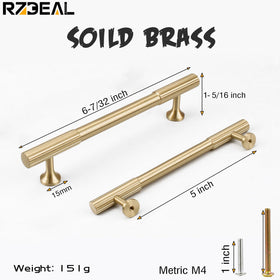 Brushed brass RZDEAL pull adds warm accent to kitchen cabinets and drawers.