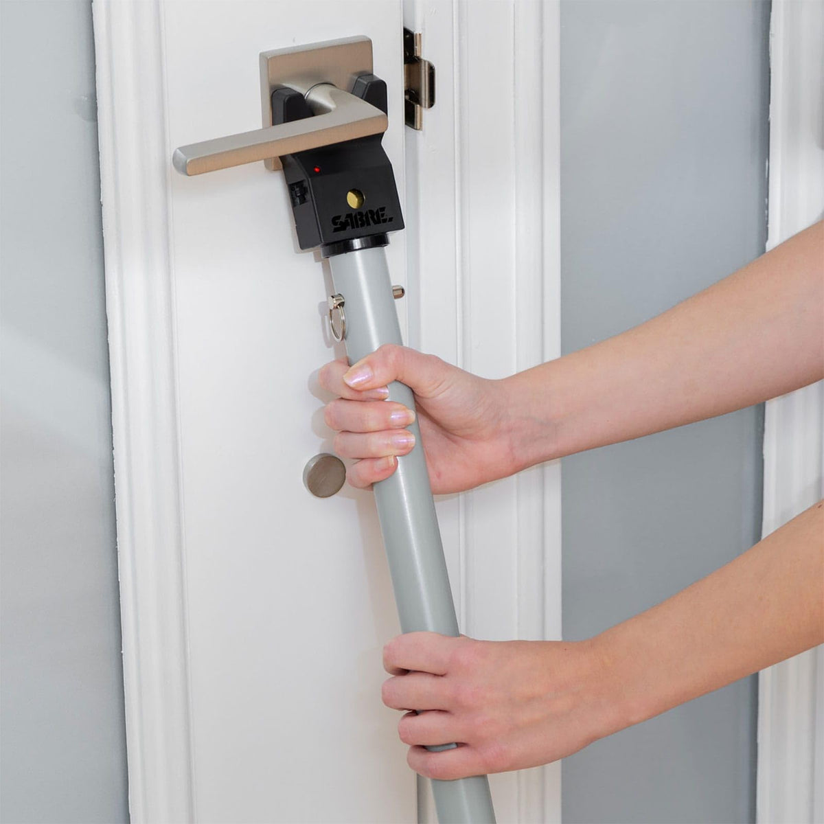 SABRE security bar with padded foot grip for stable, floor-friendly use.