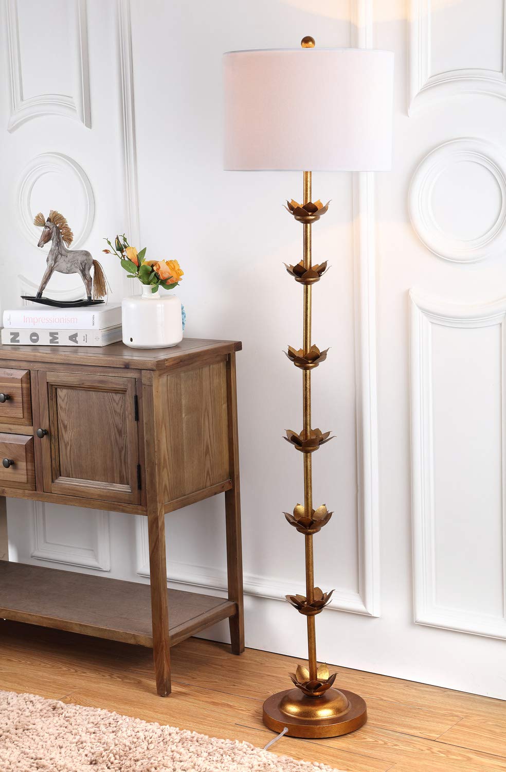SAFAVIEH Landen antique-gold-finish iron frame adds timeless style.
