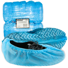 Safeko premium disposable boot covers showing non-slip blue sole for floor protection