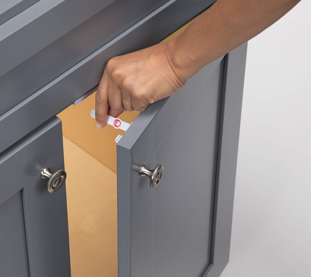 Safety 1st kitchen cabinet installation on a cabinet door example for families.
