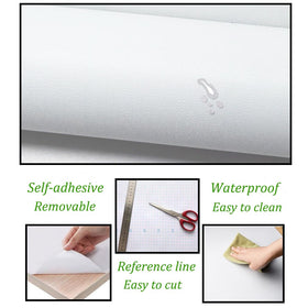 Safiyya white peel-and-stick application demonstrates easy, no-glue installation for a fresh look.