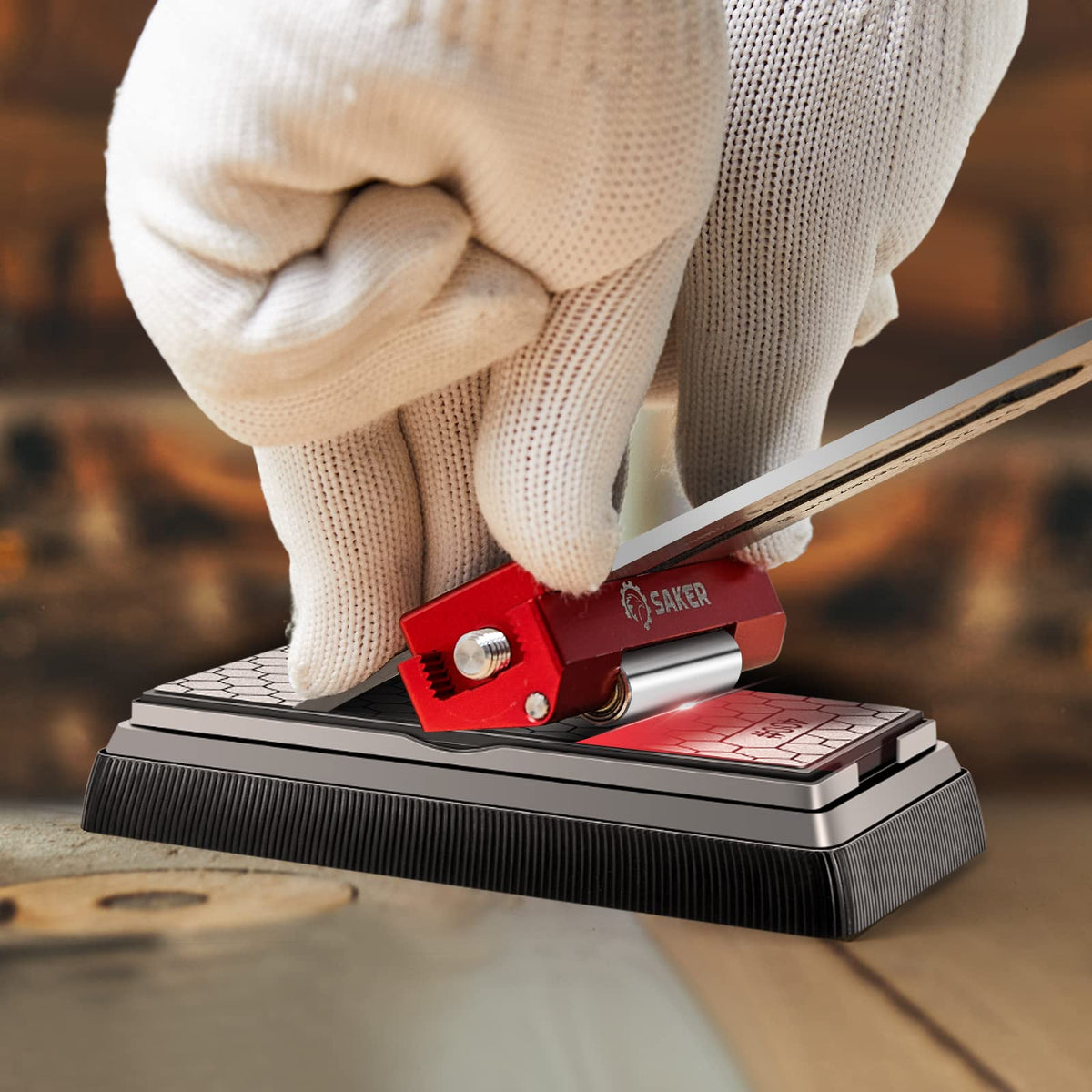Saker honing guide in use with sharpening stones showing uniform edge results