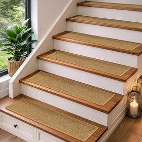 SANDPEAK non-slip beige stair treads close-up showing secure backing for safe footing.