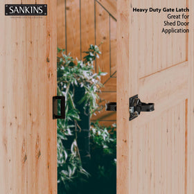 SANKINS Swinging Shed Door Latch in garden gate setting, blends with outdoor decor yet stays sturdy.