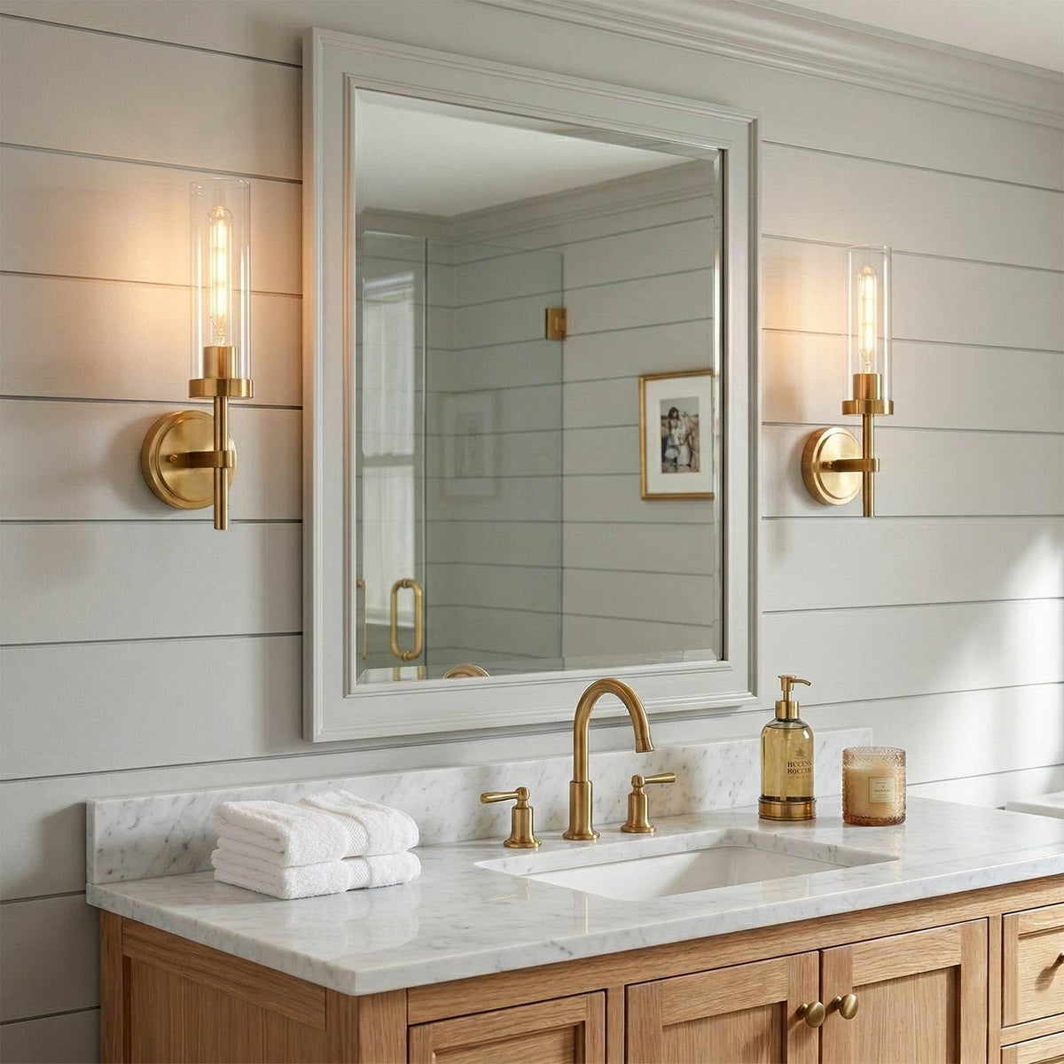 SANTOSTOCK brushed-brass wall sconce finish adds warm ambient vanity lighting