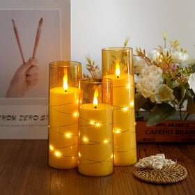 Gold Sasigeiaa candle set adds elegant décor and flame-free ambiance.