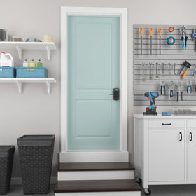 Schlage Camelot lever handle integrated with door hardware for smooth operation.