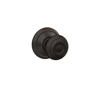 Schlage F10 GEO 716 on-door knob demonstrates easy, non-locking passage.