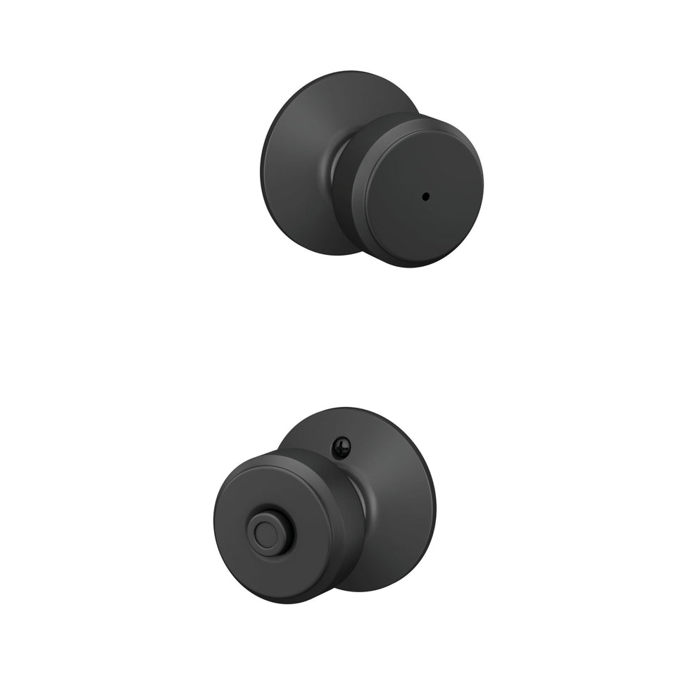 Schlage F40 Bowery matte black knob close-up highlighting privacy lock