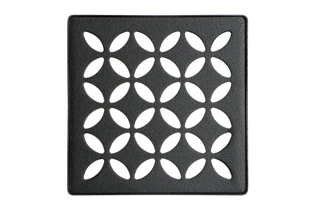 Schluter Kerdi-Drain floral shower grate with integrated bonding flange for secure waterproofing in tile showers.