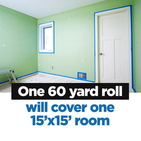 Masking tape protecting baseboards and trim during color changes.