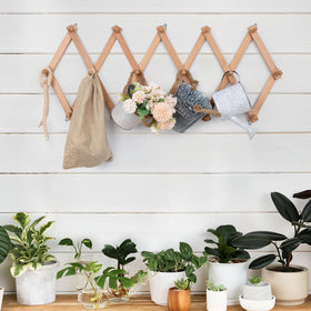 SCUNDA space-saving solution suits coats, hats, bags, and more in one place.
