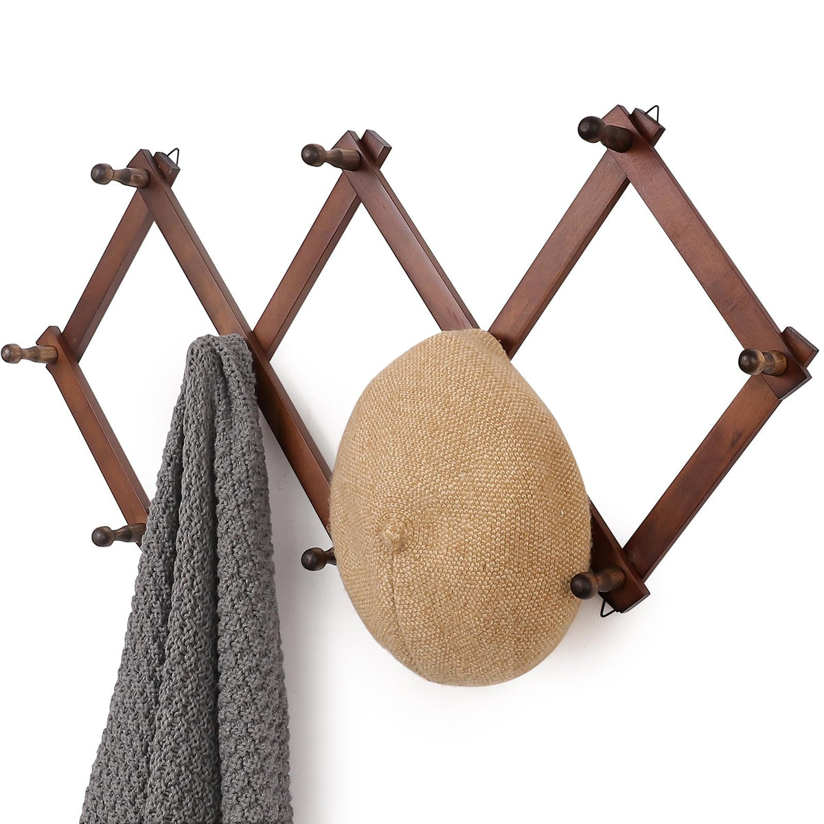 SCUNDA wall rack with 10 hooks keeps coats and accessories neatly organized.