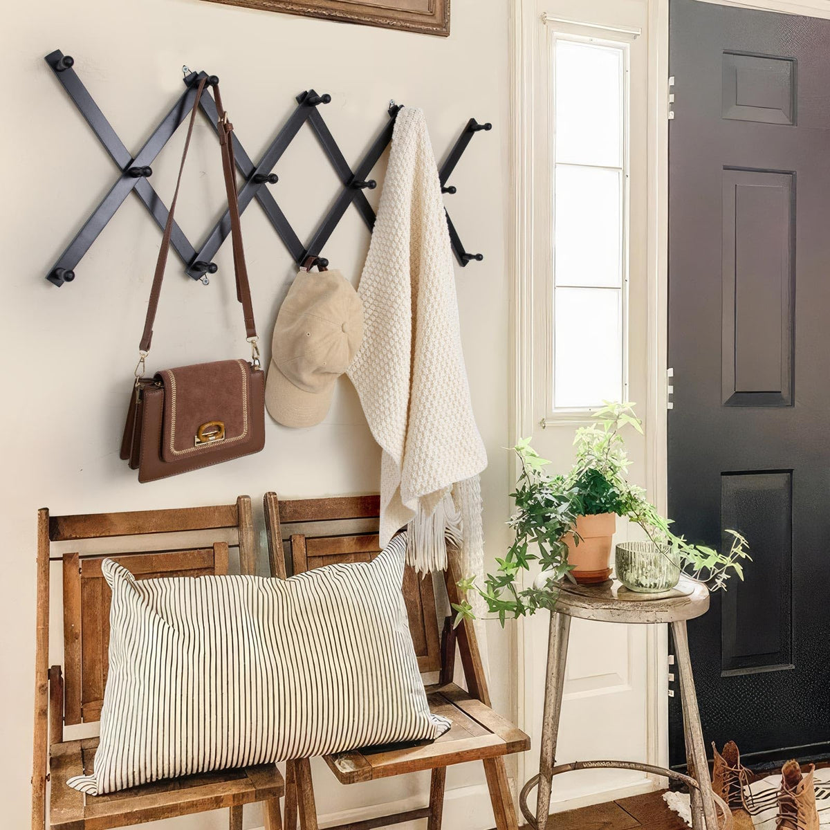 SCUNDA wall rack holds hats, coats, and bags in one place