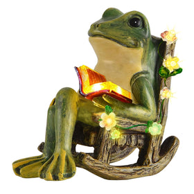 Scuyari solar frog statue resting on a rocking chair enhances outdoor charm at dusk.
