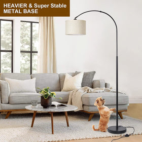 Seaside village Arc Floor Lamp over couch creates focused living room lighting.