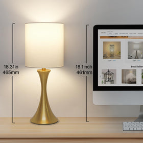 Seaside Village bedside lamp on a nightstand for mood lighting.