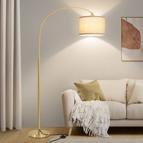 Seaside village Gold Arc Floor Lamp base provides wobble-free stability for living room lighting.