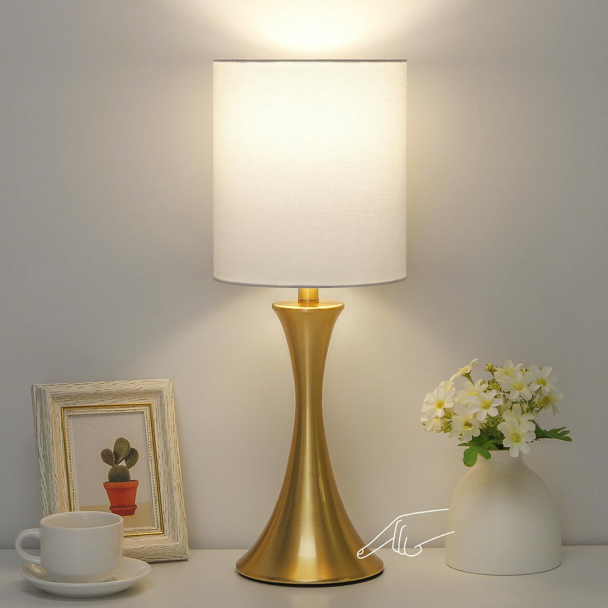 Seaside Village gold bedside lamp base with a sleek modern silhouette.