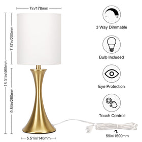 Seaside Village gold bedside lamp shade adds warm ambiance.