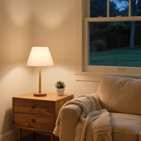 Seaside Village table lamp shade enhances cozy reading light.