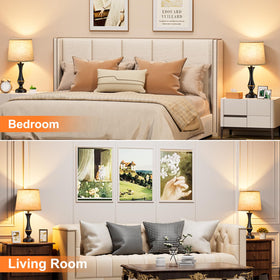 Seealle black metal base and beige linen shade in a modern setup.