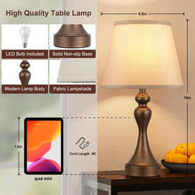 Seealle brown-oat finish decor lamps complement bedroom and living spaces.