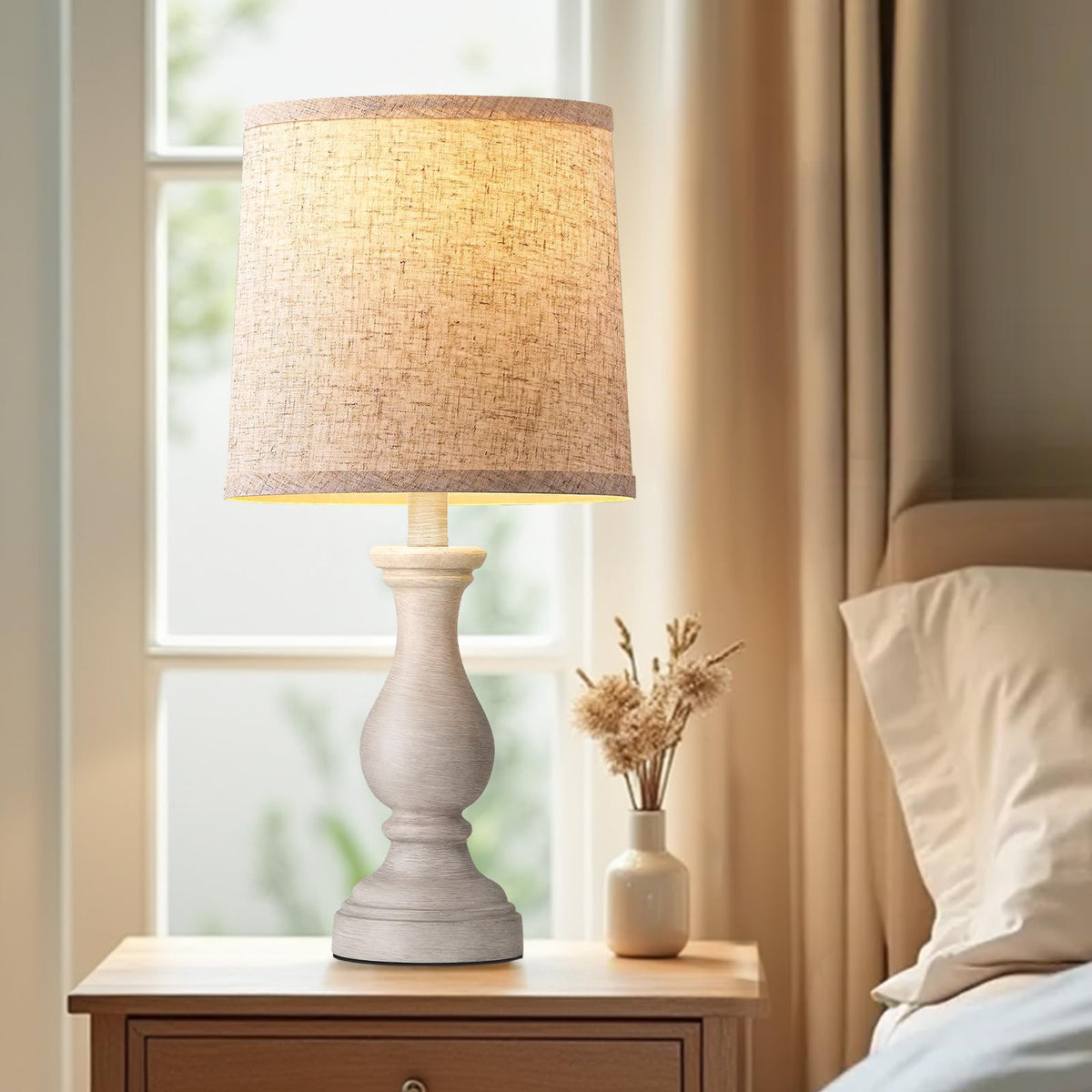 Seealle linen shade softens light for a warm bedside glow.