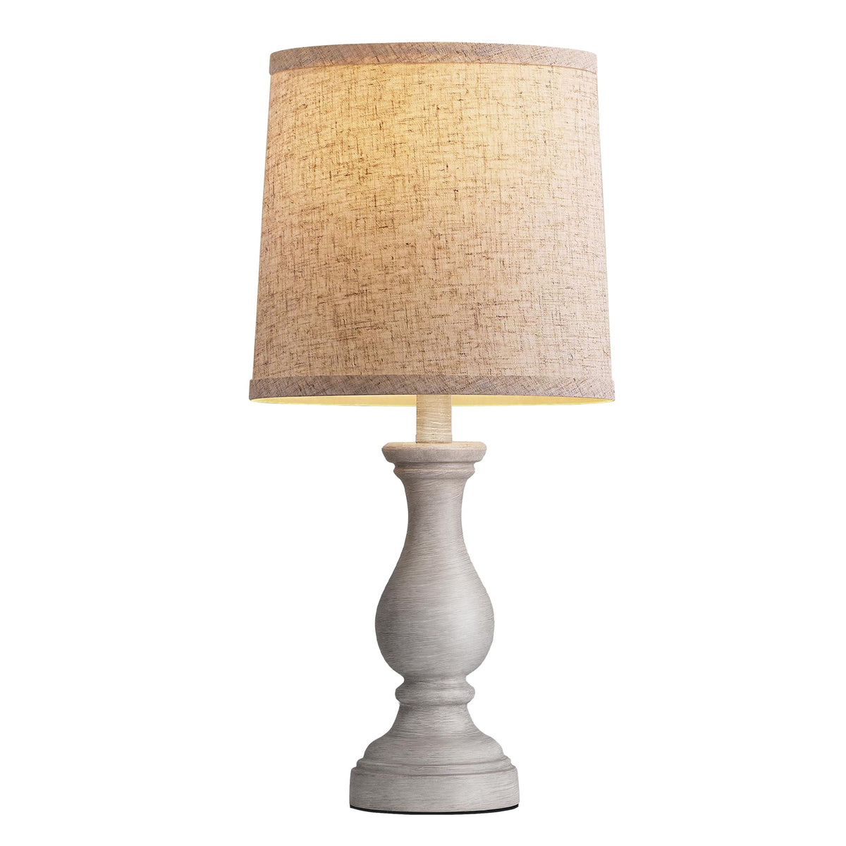 Seealle lamp at entryway stand adds welcoming glow.