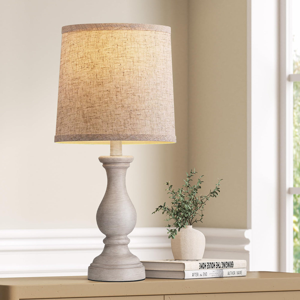 Seealle farmhouse lamp with wood base and linen shade creates warm bedroom ambiance.