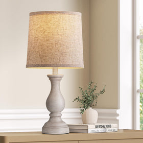 Seealle farmhouse lamp with wood base and linen shade creates warm bedroom ambiance.