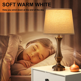 Seealle beige linen shade atop a black metal base for elegant decor