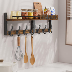 Segtenant rustic brown wood and black iron accents create vintage industrial look.