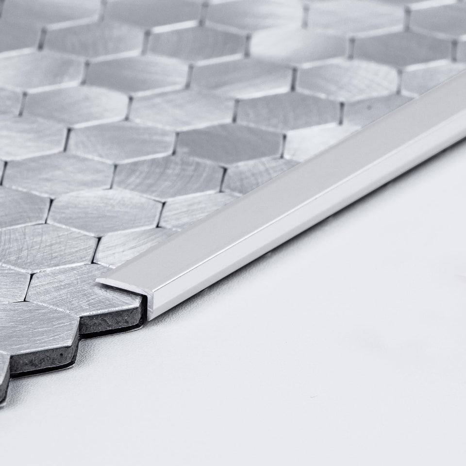 SELECT LIGHTING brushed nickel edge trim for hexagon tiles enhances edge durability.