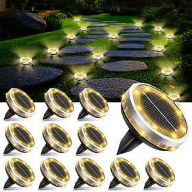SenLuKit solar ground light with eight top LEDs brightens pathways at night.