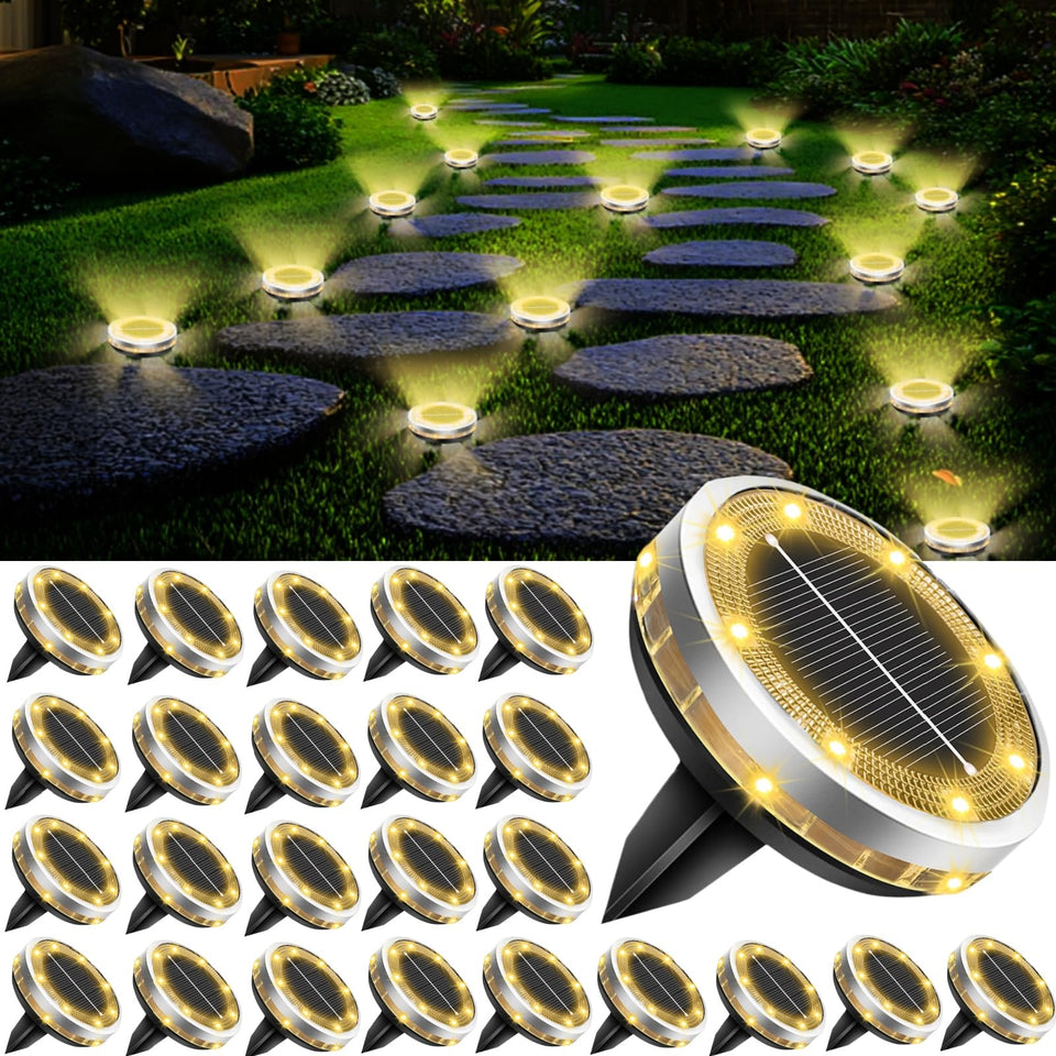 SenLuKit solar ground lights 26-pack illuminate pathways with warm white tone.