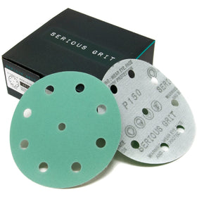 Serious Grit 5-inch 9-hole disc close-up shows durable film for smooth sanding.
