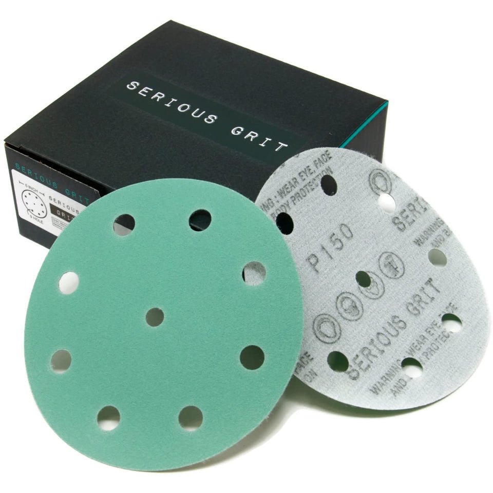 Serious Grit 5-inch 9-hole disc close-up shows durable film for smooth sanding.