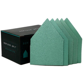 Serious Grit 80 grit triangle sanding sheet on wood showing quick material removal