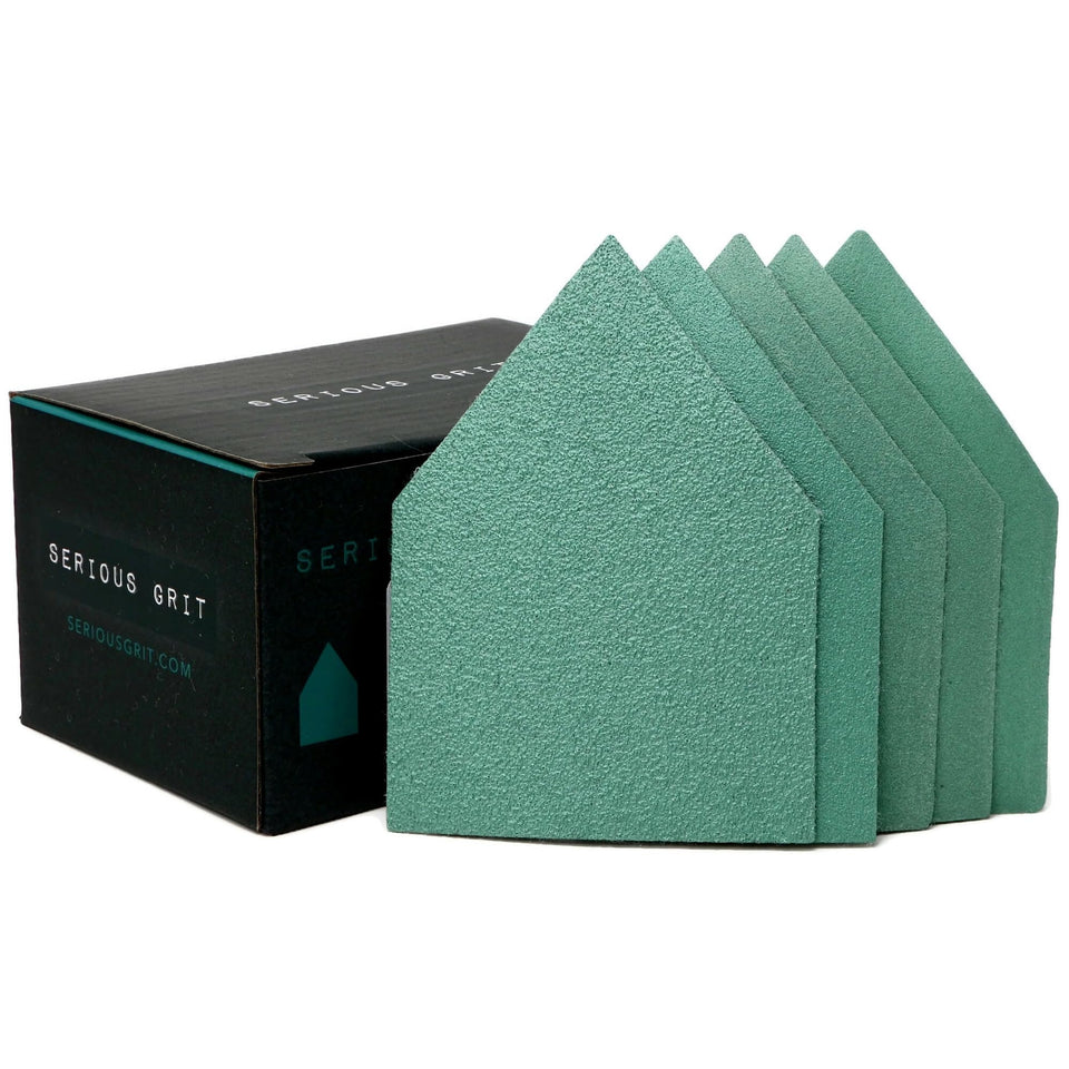 Serious Grit 80 grit triangle sanding sheet on wood showing quick material removal