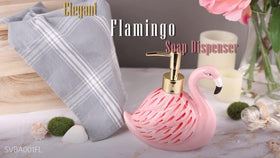 Flamingo dispenser beside bathroom sink enhances vanity decor.