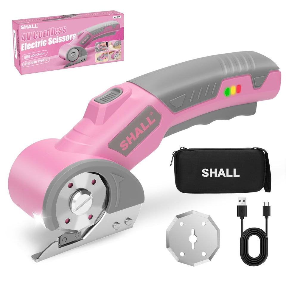 SHALL 4V cordless scissors cutting fabric with LED light for precision.