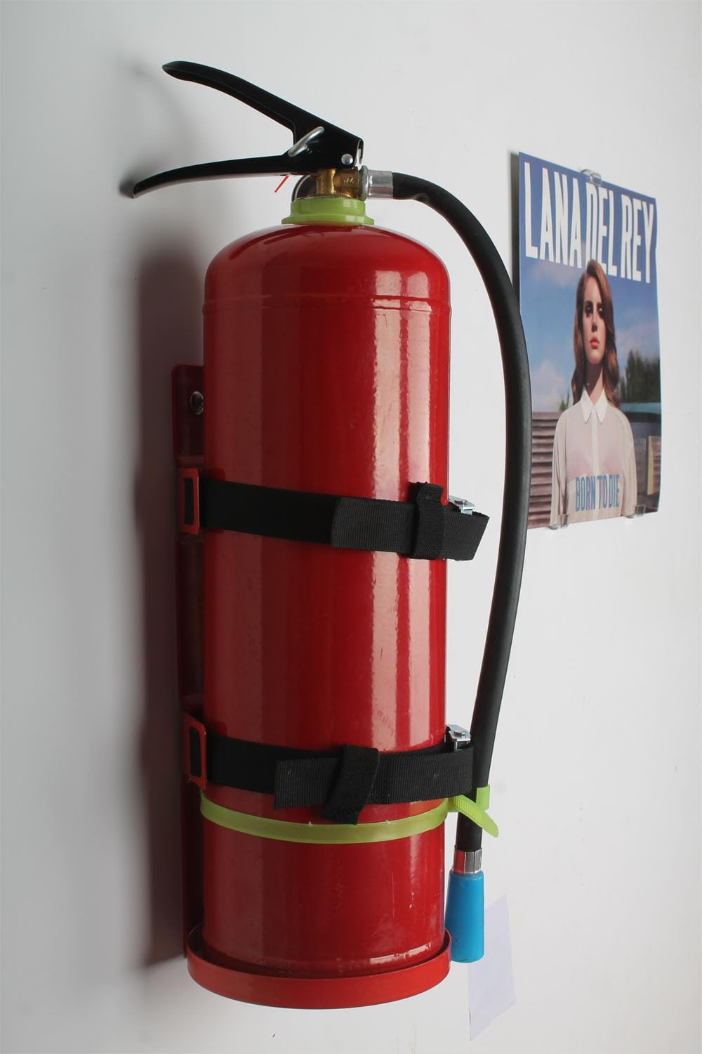 Shankala fire extinguisher bracket top view, compact space-saving design.
